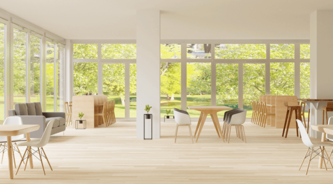clean office space with wood floors and windows