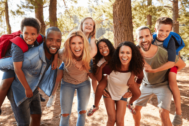 families hiking during the summer together
