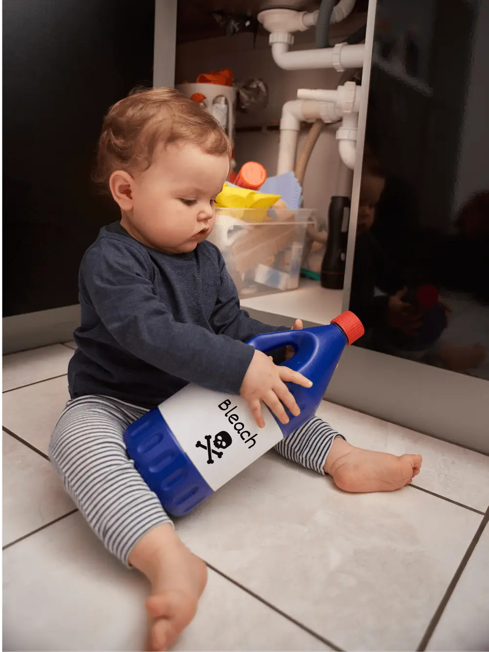 child with bleach bottle